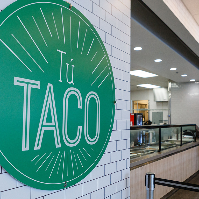 Sign for Tu Taco, one of the Student Choice food options on campus.